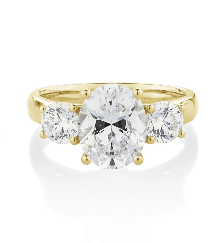 Birthstone women rings-Three stone ring with 3.5 carats* of diamond simulants in 10 carat yellow gold