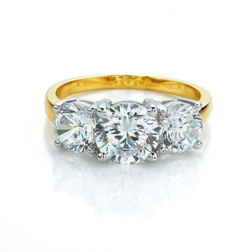 Gold plated women rings-Three stone ring with 3 carats* of diamond simulants in 10 carat yellow and white gold