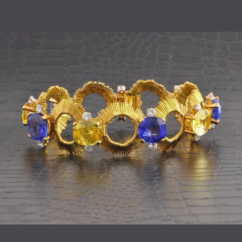 Fashion women bracelets-Vintage Gubelin 1960s Multicolored Sapphire and Diamond Bracelet in 18k Yellow Gold and Palladium