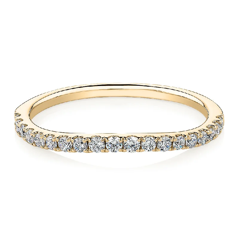 Designer gold women rings-Curved wedding or eternity band with 0.25 carats* of diamond simulants in 10 carat yellow gold