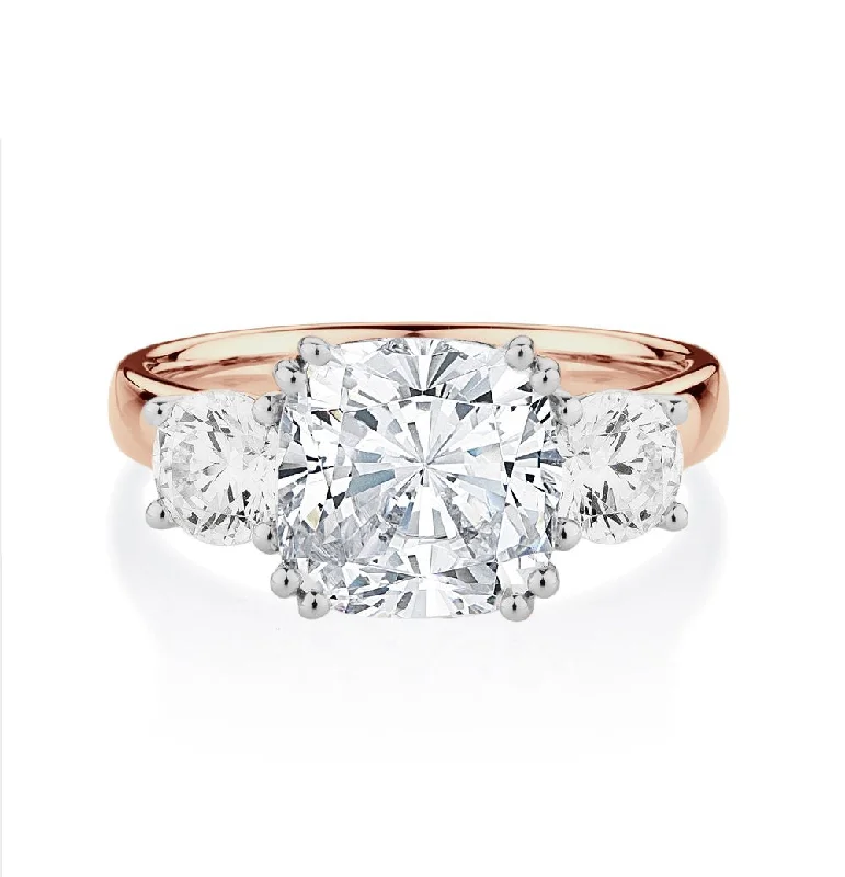 Unique diamond women rings-Three stone ring with 3.75 carats* of diamond simulants in 10 carat rose and white gold