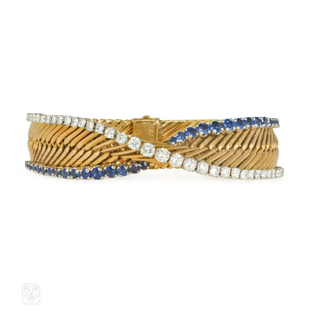 Colorful women bracelets-1950s Georges Lenfant for Gubelin diamond and sapphire bypass bracelet