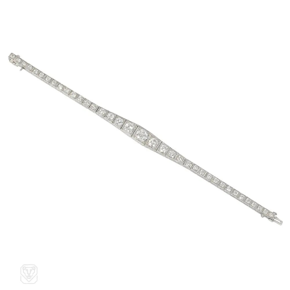 Simple bangles for women-1920s J.E. Caldwell graduated diamond and platinum line bracelet