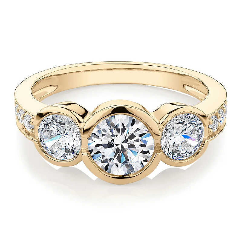 Large women rings-Three stone ring with 2.11 carats* of diamond simulants in 10 carat yellow gold