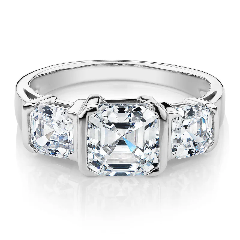 Bridal women rings-Three stone ring with 3.38 carats* of diamond simulants in 10 carat white gold