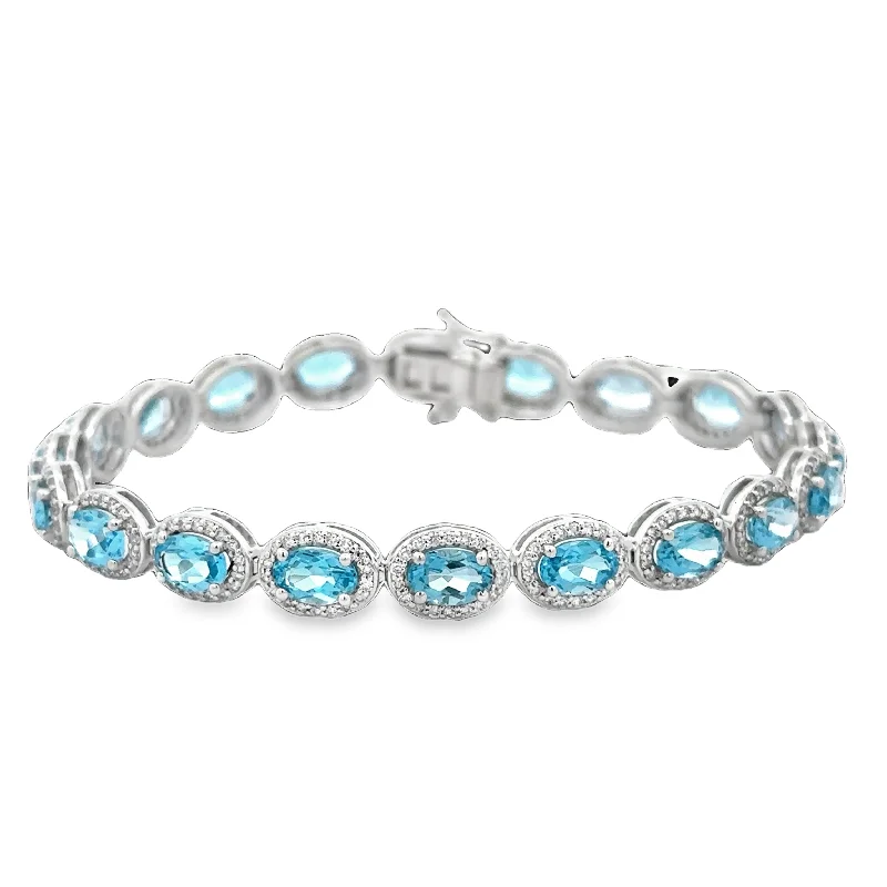 Elegant women bracelets-Blue Topaz and Diamond Bracelet in White Gold